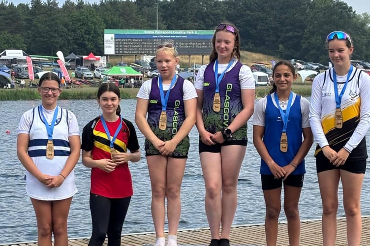 Amaya Raynor, second from left, was third in the 1000m U14 girls K2