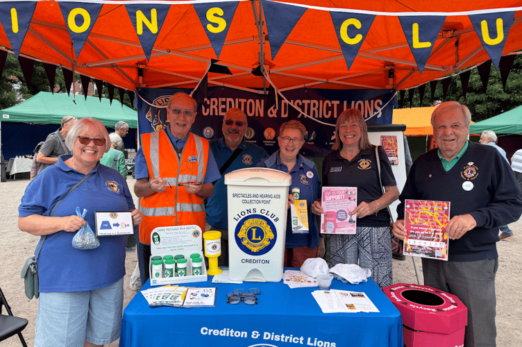 Members of Crediton Lions who collected donations of bras, spectacles and hearing aid batteries at Crediton Farmers’ Market.  AQ
