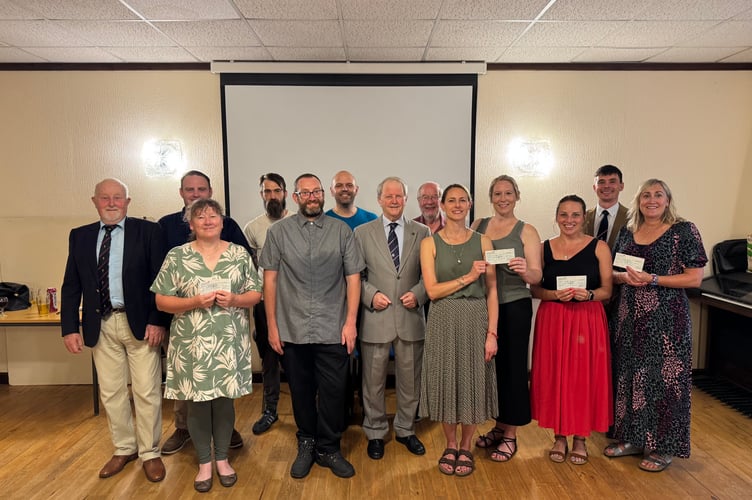 Cheque recipients with Worshipful Master Chris Burrow, Unity Lodge, centre.  AQ 6411
