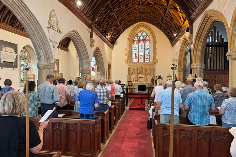 A large congregation for the Songs of Praise service at St Swithun’s Church, Shobrooke.  AQ 6697
