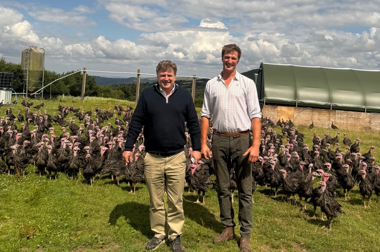 Mel Stride MP and John Malseed at Frenchbeer Farm near Chagford.
