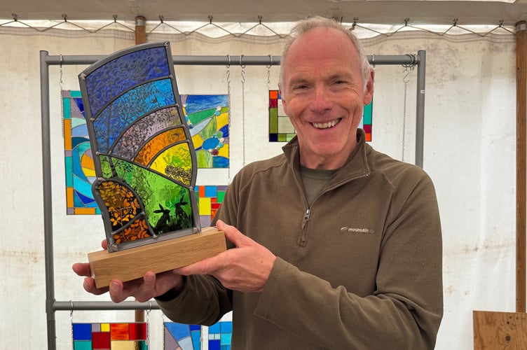 Ken Bracher of Ken Brancher Stained Glass from Chulmleigh had a stand exhibiting his examples of stained glass work. AQ 7598
