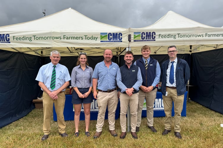 Crediton Milling Company staff pictured on their stand before it got incredibly busy. AQ 7516