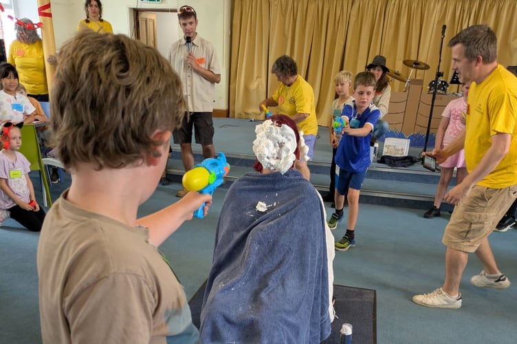 Antics with water pistols and shaving cream (Crediton Congregational Church)