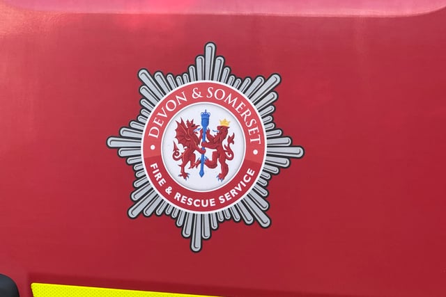 Firefighters battle Hollacombe house fire