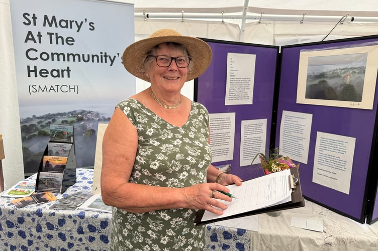 Marilyn Daw signed up people for the Friends of St Mary’s Church, Morchard Bishop. AQ 8149