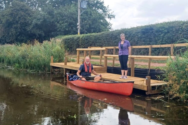 Canal Ranger Craig Saunderson and Minnows Touring Park Owner Julie Evans at the new landing stage beside Holbrook Bridge
