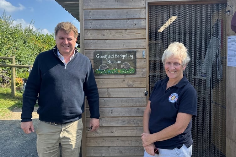 Mel Stride with Pam Pemberton at Greatfield Hedgehog Rescue.
