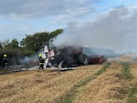 Three crews at combine harvester fire
