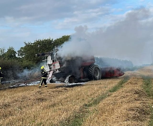 Three crews at combine harvester fire
