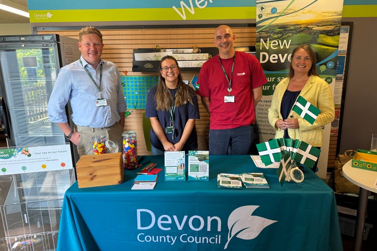 Capturing feedback on the public’s views about Devon’s future, at Crediton Library on Tuesday, August 12 were, from left, Simon Kitchen, Head of Communities with Devon County Council, Alice and Martin from DCC’s communications department and Delores, a DCC officer.  AQ 9669
