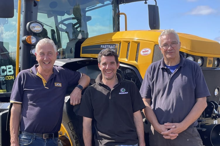 From left, Dave Roberts of Beares Stoke Canon, Martin Thorne of Bratton Fleming and Martin Petherick from South Molton who organised the display of 50 vintage and modern tractors