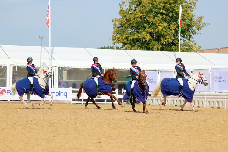 The QE Equestrian team during the lap of honour after becoming British Showjumping Just for Schools Champions.
