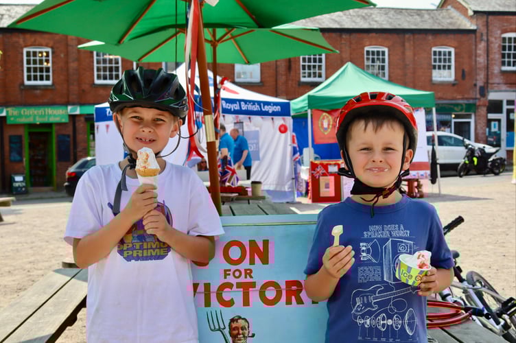Youngsters enjoying the free ice creams at Crediton Town Square