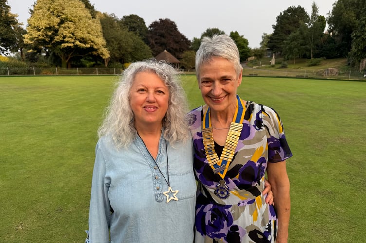 Dee Saunders, Crediton and District Playscheme for Children with Special Needs, left, with Jane Brimacombe, President of Crediton Boniface Rotary.  AQ 0572
