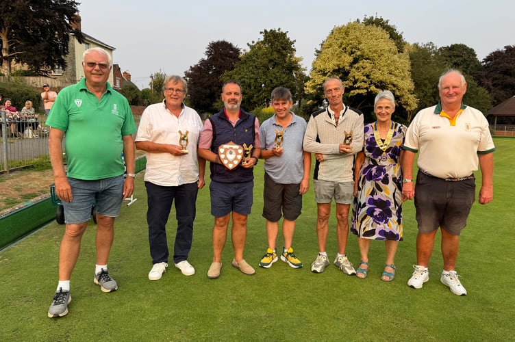 The Industrial Bowls runners-up team from Graphic A with Mike Canning, chairman, Crediton Bowling Club, left, and right, Jane Brimacombe, President of Crediton Boniface Rotary and Rotarian Paul Radnor.  AQ 0557
