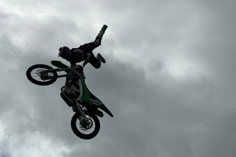 Jamie Squibb during his motorcycle stunt display.  AQ 9849
