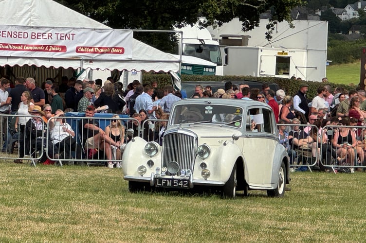 A lovely car during the Parade of Vintage Vehicles.  AQ 0254
