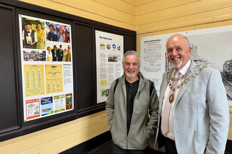 David Gosling, who provided some photographs and information for the display and the Mayor of Crediton, Cllr Steve Huxtable. AQ 0838