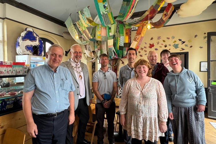 In the Crediton Station Tea Rooms, which is run by The Turning Tides Project, where acoustic management has included sound boards in the form of clouds, art work in the form of a cloth tree, curtains and other furniture. AQ 0879
