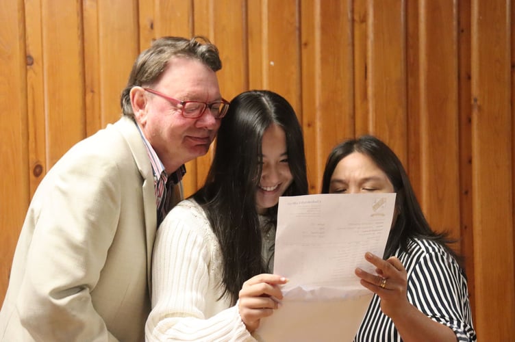Francesca Trimming gained 11 GCSEs, 8 at the highest Grade 9, pictured after opening her results.