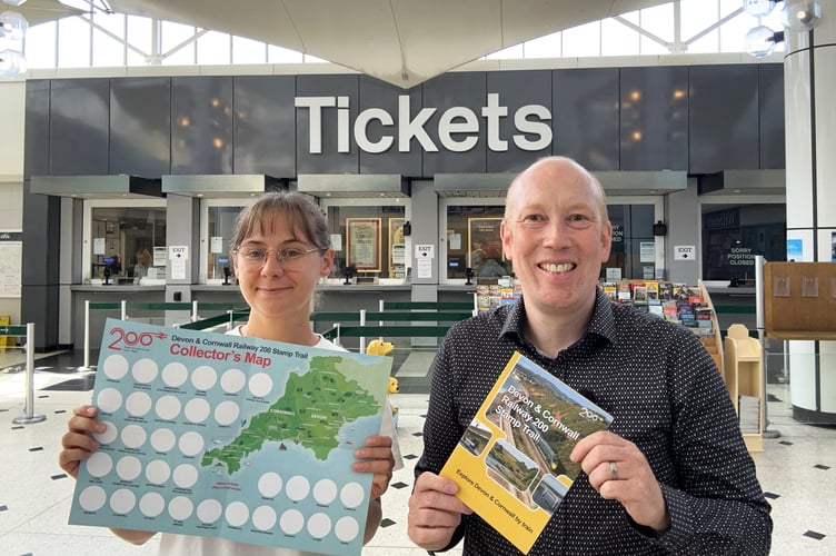 Betsy Saunders and Mike Parker-Bray of the Devon and Cornwall Rail Partnership with the Stamp Trail booklet.
