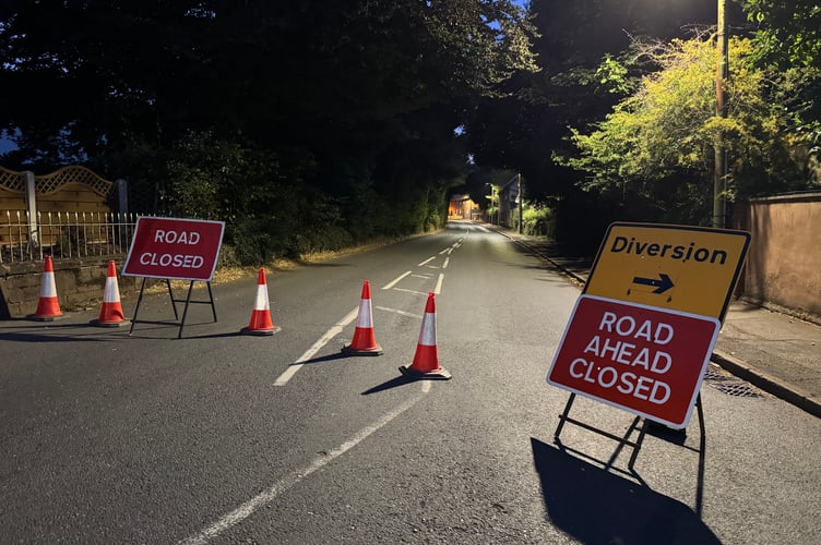 The road signs indicating the Exeter Road road closure in Crediton. AQ 1609
