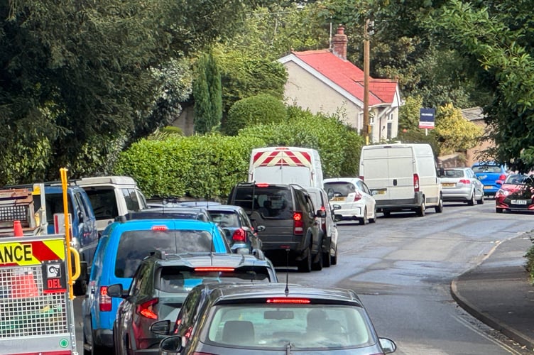Traffic queuing in Blagdon, Crediton, due to the A377 road closure in Exeter Road. AQ 1618