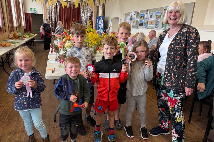 The children’s class winners at Zeal Monachorum Village Show with Eric Eden. AQ 1687