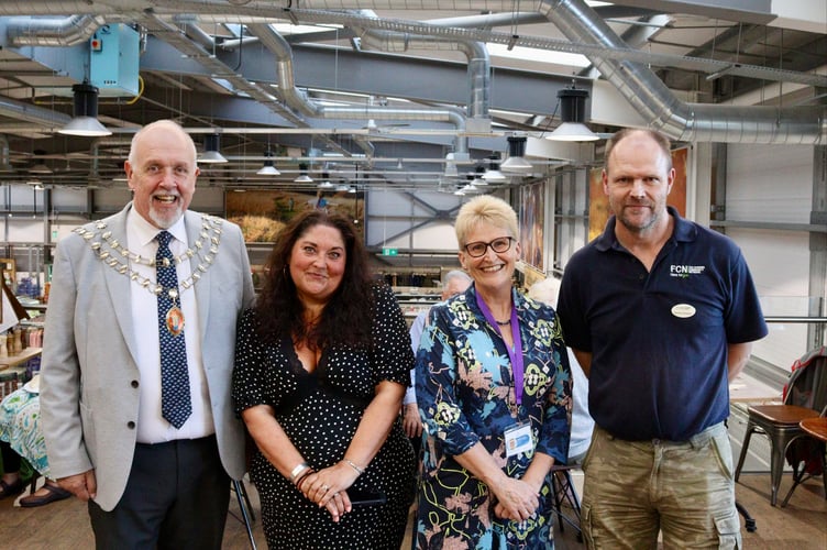 Vintage Farmers Group Summer Party 4 September 2025 From left, Mayor of Crediton Steve Huxtable, Tamlyn Fraiquin and Emma Healey of Involve Mid Devon, Richard Sampson of the Farming Community Network (Will Goddard, Crediton Courier)
