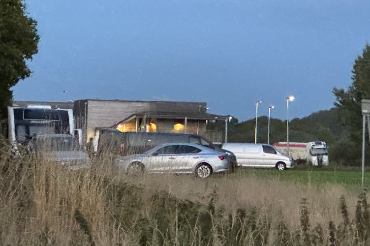 Some of the caravans and cars on the area of land behind Crediton Tesco superstore near the Redlands Surgery.  AQ 2652
