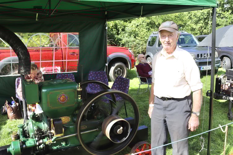 13 September 2025 Tedburn Village Fair Ian White of Bow showed off his 1921 Ruston Hornsby stationary engine (Will Goddard, Crediton Courier)