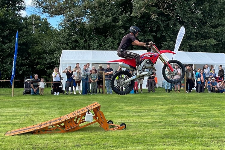 Dangerous Steve jumping a ramp on a motorcycle