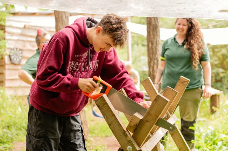 The Outdoors School students with staff members.
