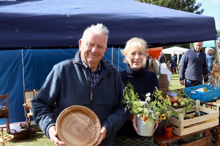 Colin Dagnall and Alison Ayres of Shobrooke Allotment Association sold produce and handmade wooden items