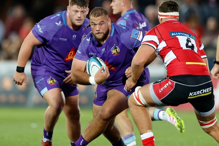 Exeter Chiefs prop Josh Iosefa-Scott takes on the Gloucester defence during their Premiership Rugby Cup clash at Kingsholm