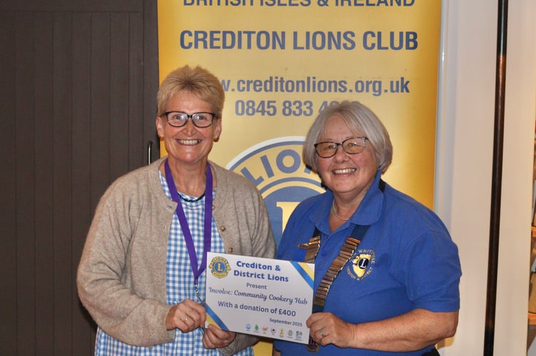 Crediton Lions Club President Ann Whitehouse with Emma Healey of Involve Mid Devon