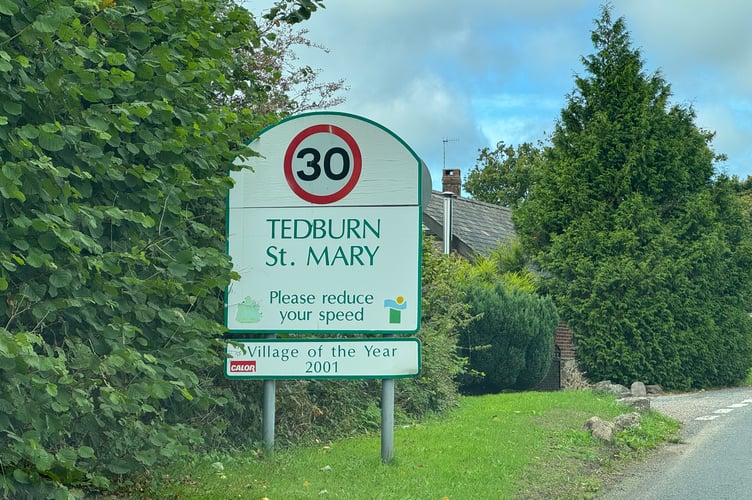 Tedburn St Mary road sign.  AQ 206
