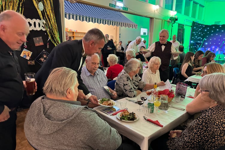 CODS members served food to the audience on each of the September musical evenings.  AQ 3452
