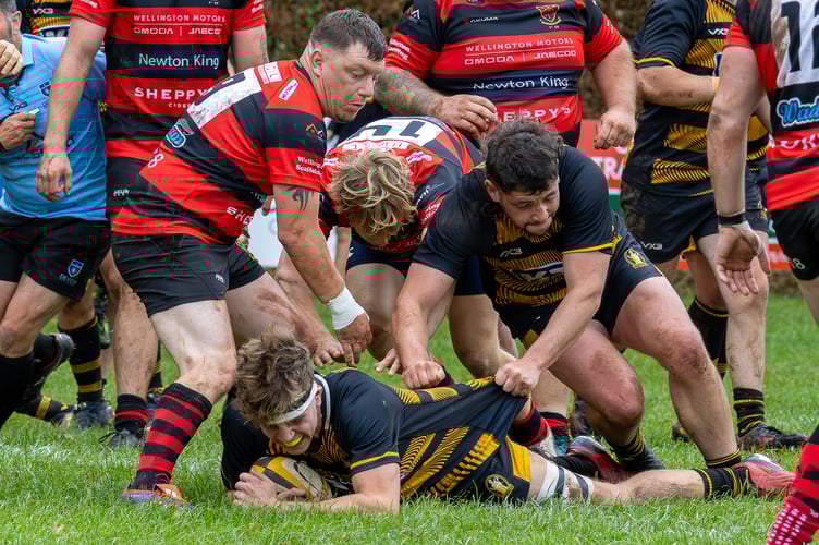 Ben Harris of Crediton with the ball during the game against Wellington.
