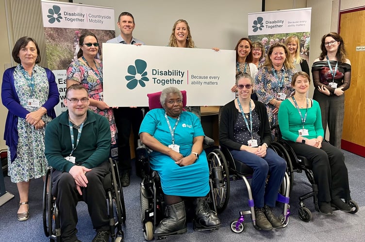 Disability Together team including Stephanie Lewis, CEO, centre, at the back of the photo.
