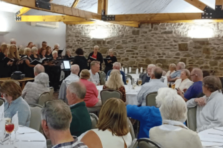 Tedburn Community Choir singing at the Mid Devon Farming Life Group Harvest Meal.
