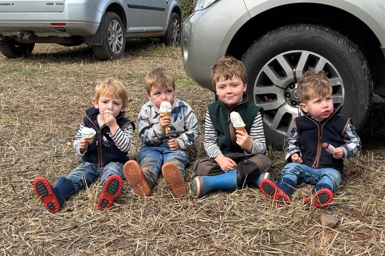 Four youngsters take a break from spectating for an ice cream at Cheriton Fitzpaine Ploughing Match.  AQ 3696
