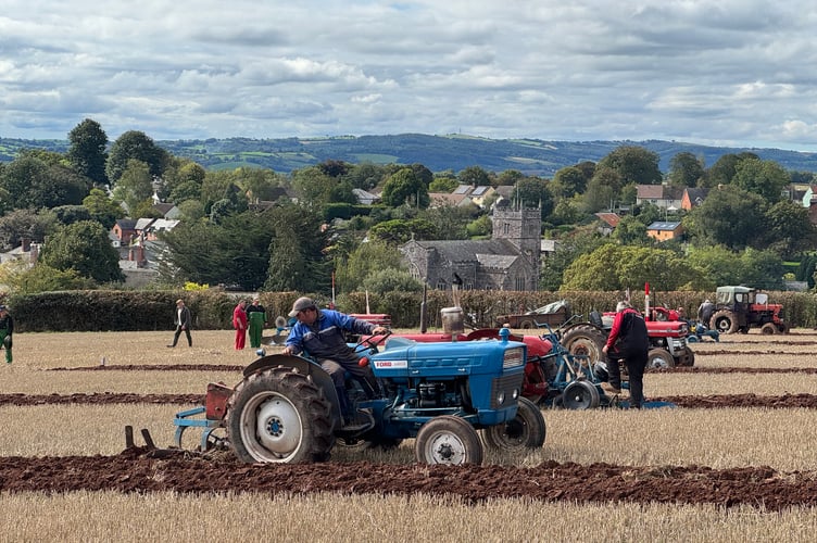Ploughing at Cheriton Fitzpaine Match with Thorverton Church in the background.  AQ 3579
