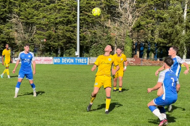 All eyes on the ball: Crediton in blue during a previous home game in September.  AQ 3433
