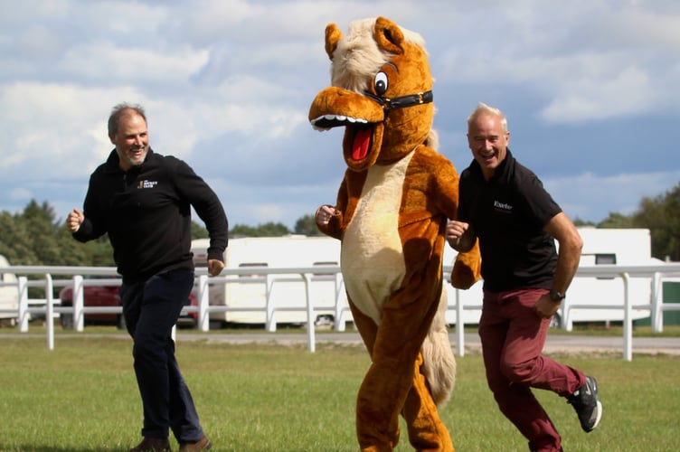 Jack Parkinson, Dexter and Jason Loosemoore limber up at Exeter Racecourse
