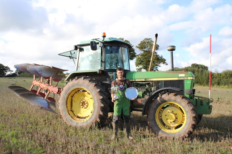 Jason Kneller, pictured with his John Deere 3050 and reversible plough, won three awards, Best Local Reversible, Best local with three or more furrows and Best Reversible at Witheridge match.
