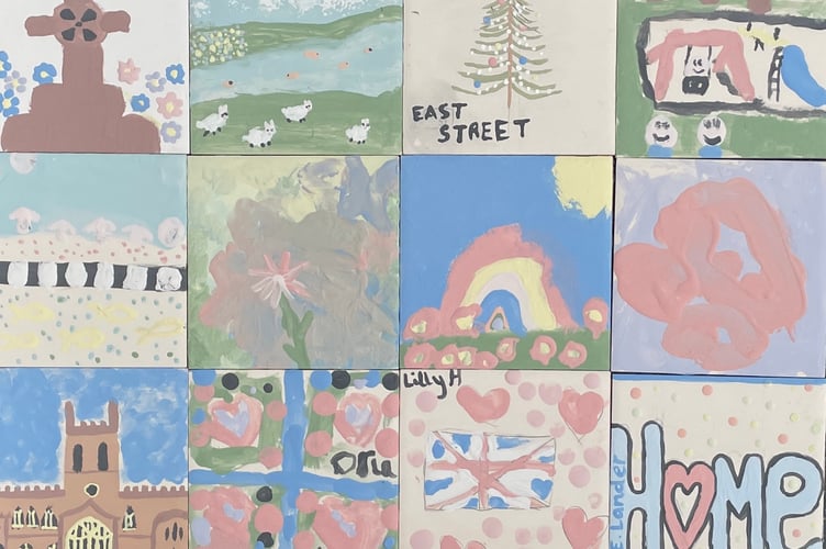 Some of the designs for the collage mural, painted by local children