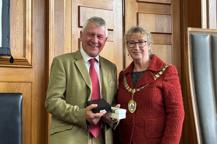 Jerry Brook served as County Councillor for the Chudleigh and Teign Valley Division from 2005 to 2025, pictured with DCC chair, Cllr Caroline Leaver. AQ 4430