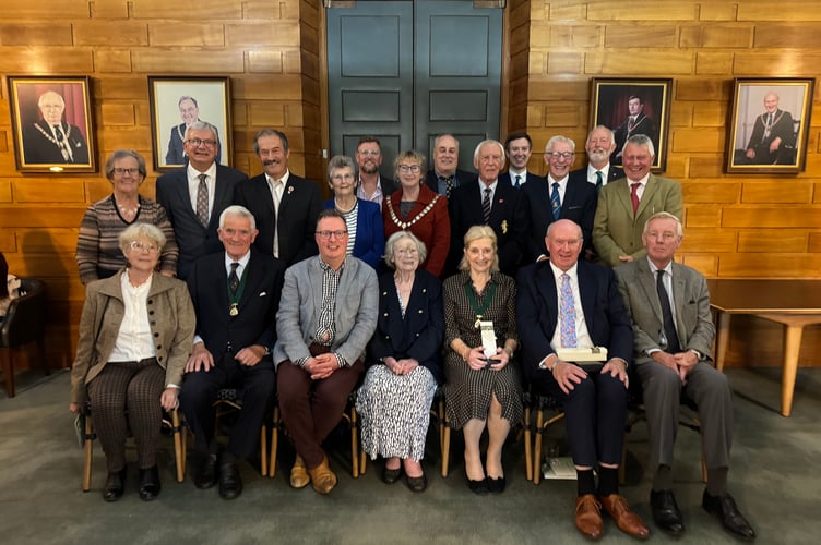 The former councillors made Honorary Aldermen of Devon with the chair of Devon County Council, Cllr Caroline Leaver with Natalia Letch, front left, who received the honour for Frank Letch.  AQ 4494
